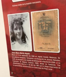 Photo of a young girl with a caption in Spanish underneath describing her death during the Bay of Pigs invasion